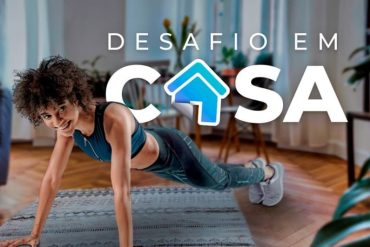 Homem e mulher treinando juntos em casa com aplicativo BTFIT