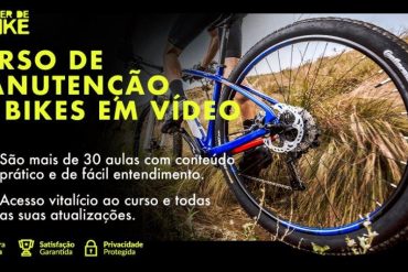Homem consertando bicicleta em oficina, curso Viver de Bike