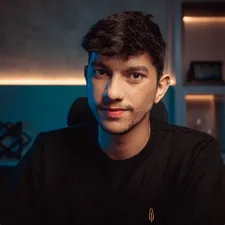 João Marcus da Fábrica de Moedas mostrando gráficos de lucro e crescimento financeiro